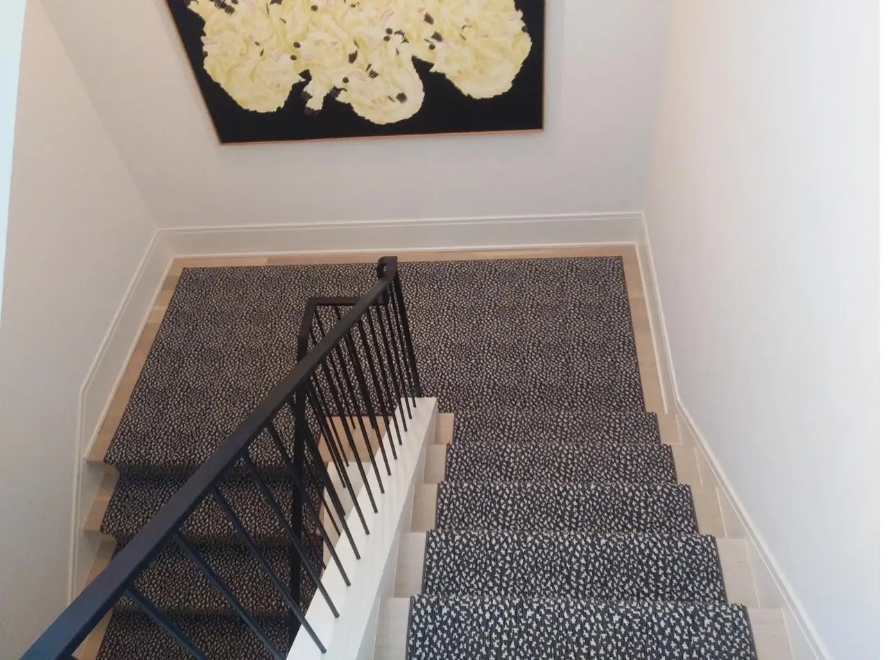 Statement patterned carpet in a sitting room — a QFI install