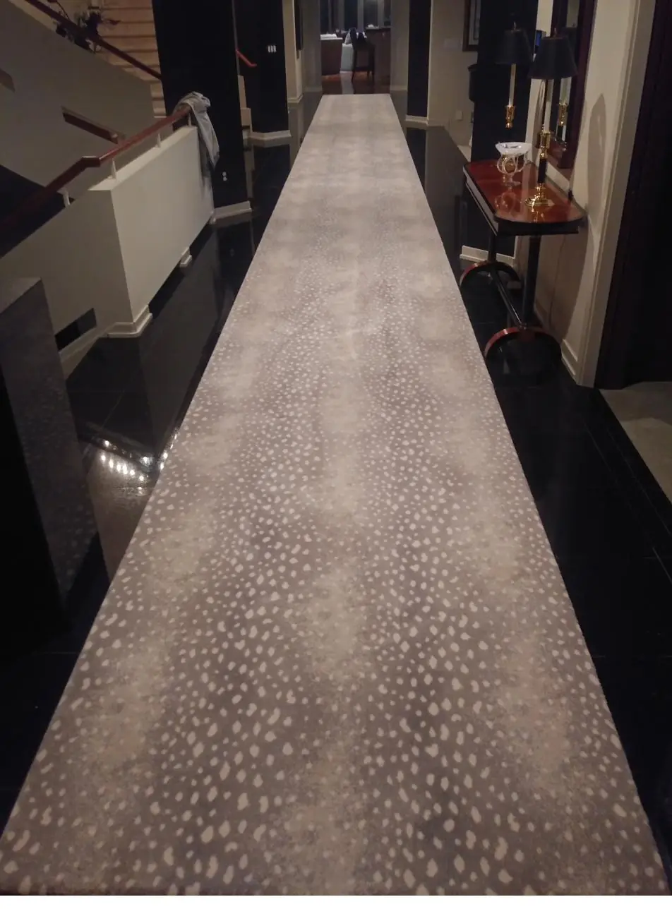 Antelope-print runner — hallway, installed by QFI
