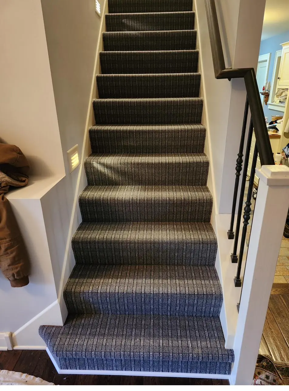 Charcoal geometric carpet — stairs & landing, installed by QFI