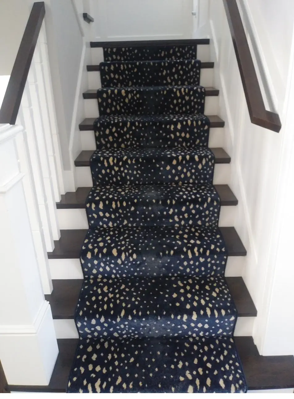 Star-pattern runner — dark treads, installed by QFI