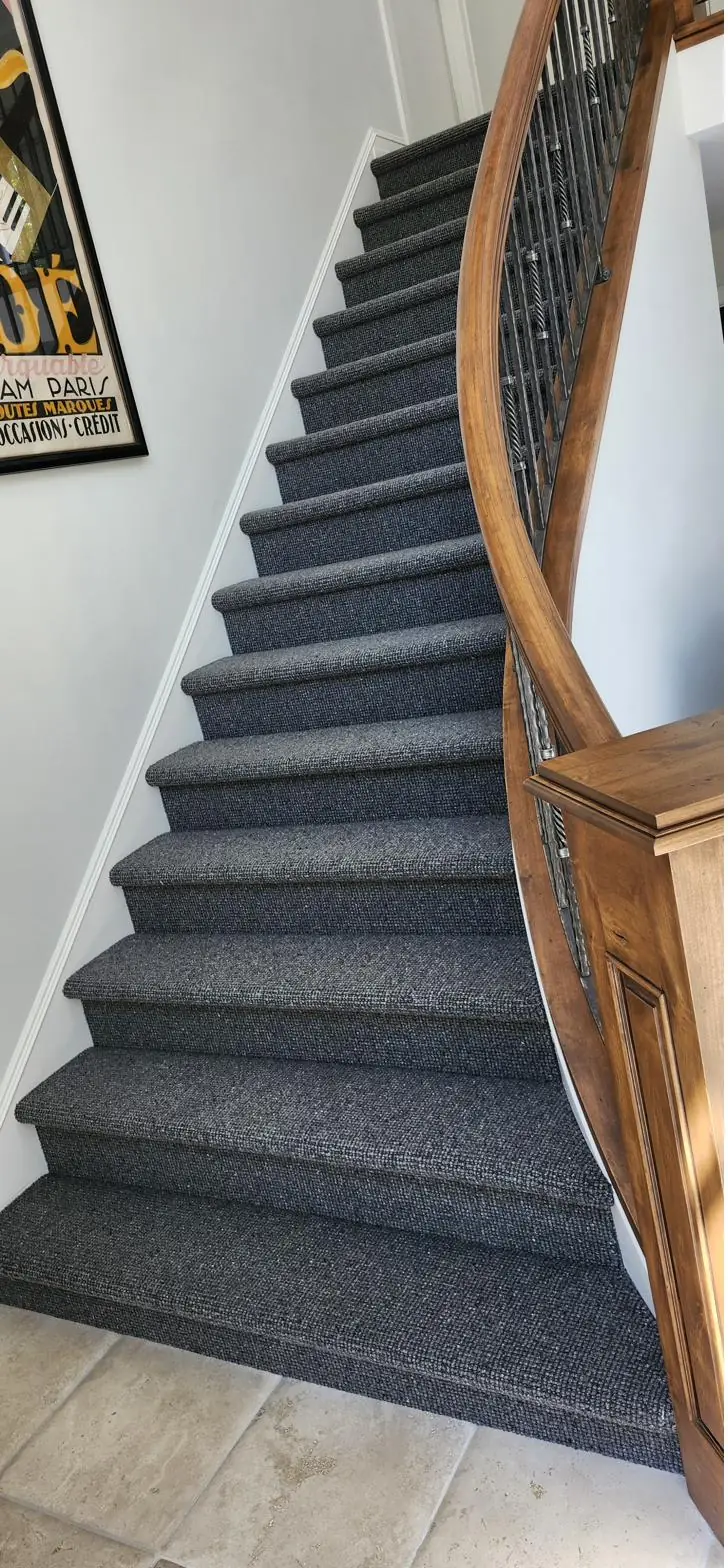 Soft beige carpet — staircase, installed by QFI