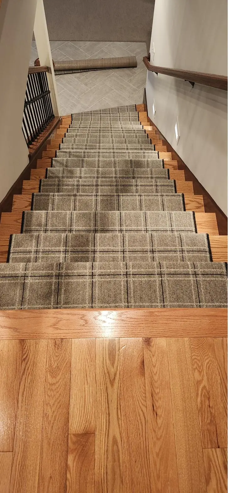 Plaid runner — oak landing, installed by QFI