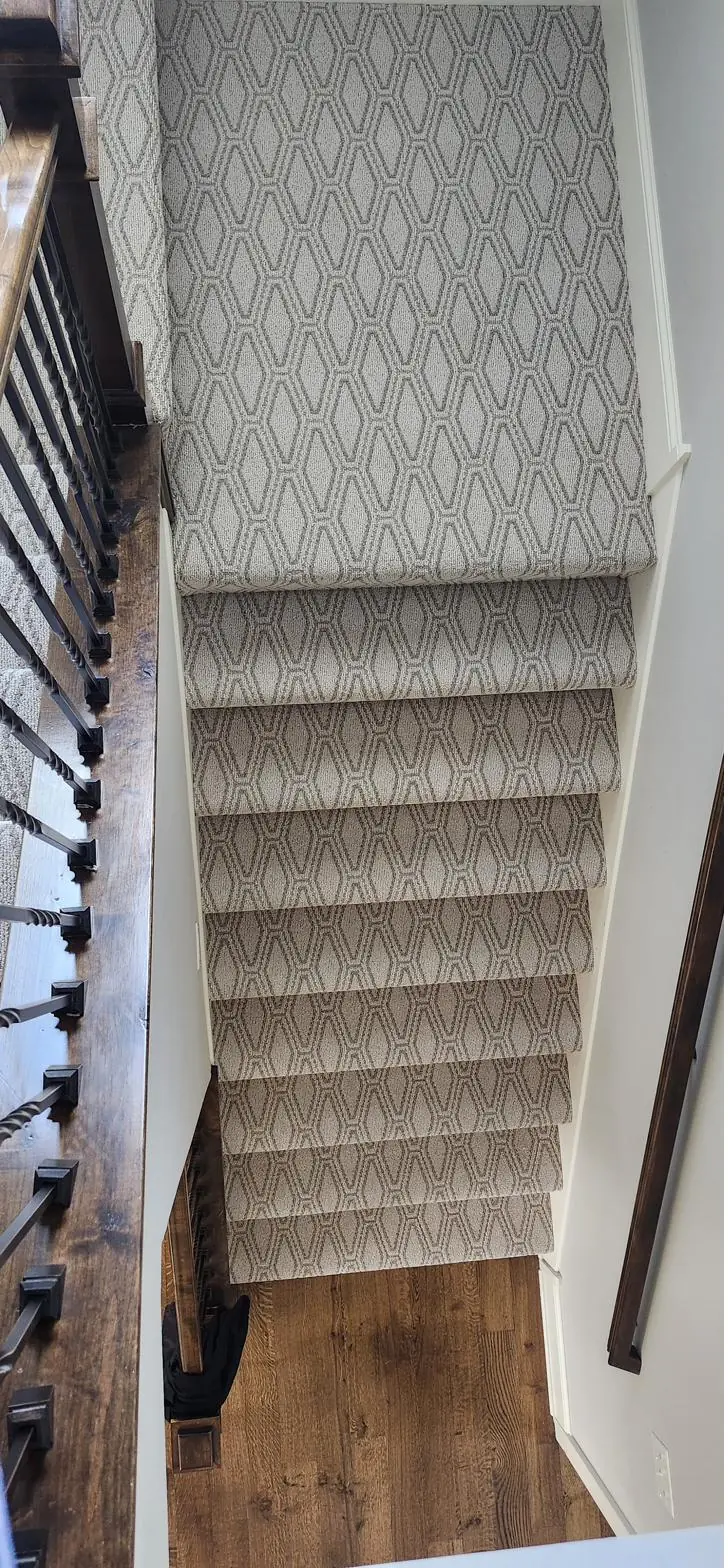 Patterned carpet — winder stairs, installed by QFI