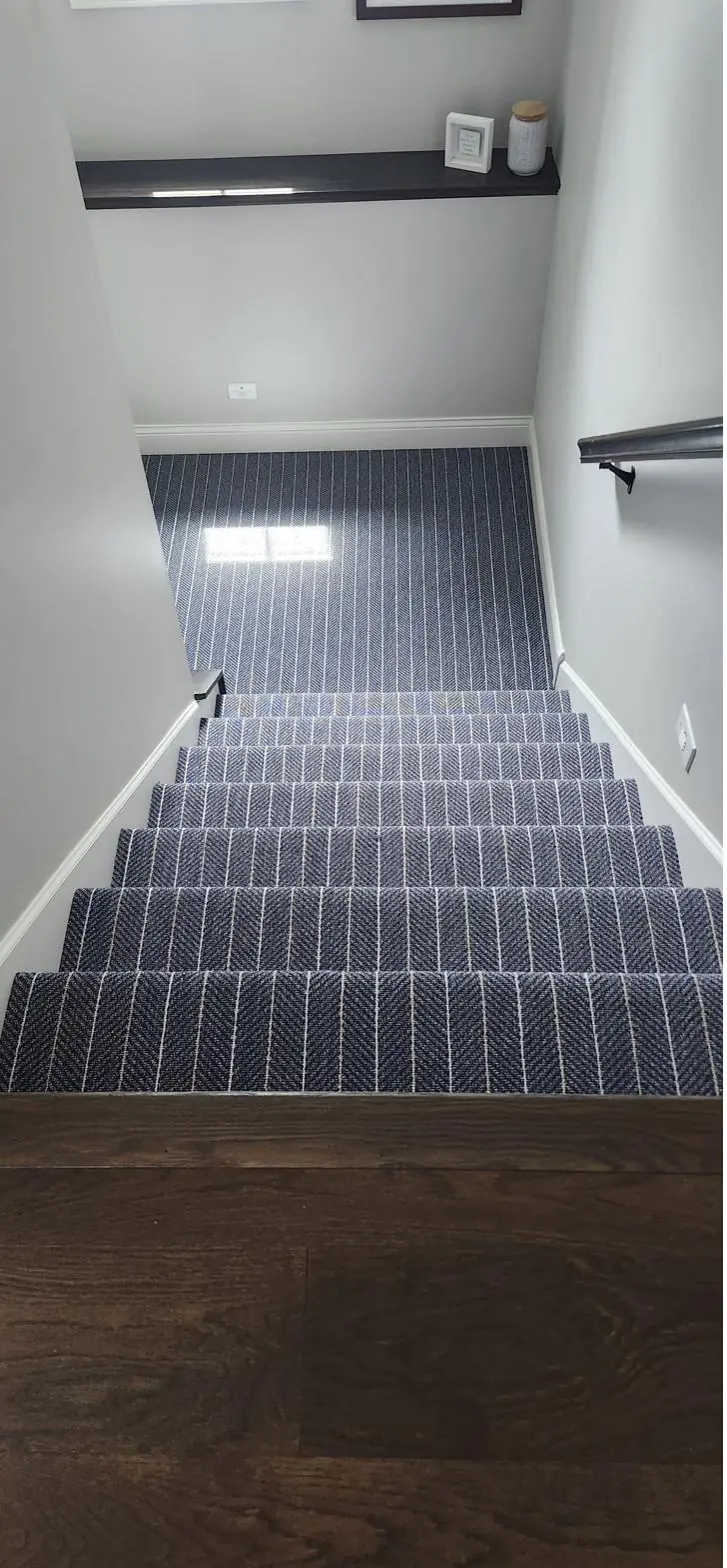 Deep blue runner — upper landing, installed by QFI