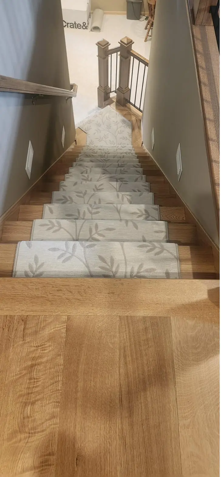 Leaf-pattern runner — wood treads, installed by QFI