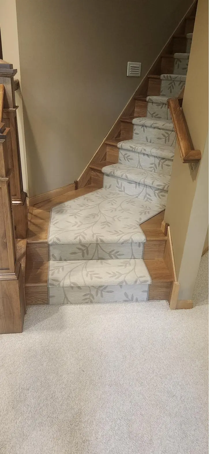 Leaf-pattern runner — to lower level, installed by QFI
